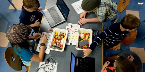 kids playing with STEAM specific toys