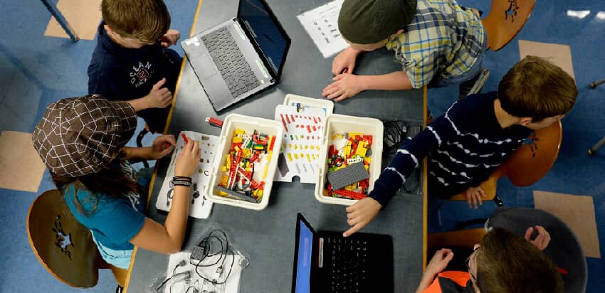 kids playing with STEAM specific toys